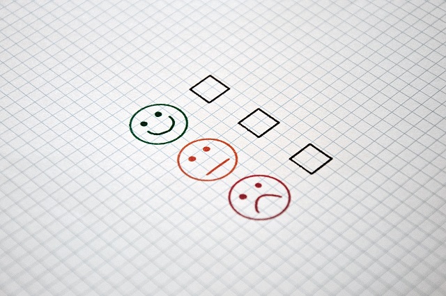 die Wohnungsübergabe Bild zeigt in Form einer Ampel drei Smileys mit unterschiedlichem Gesichtsausdruck