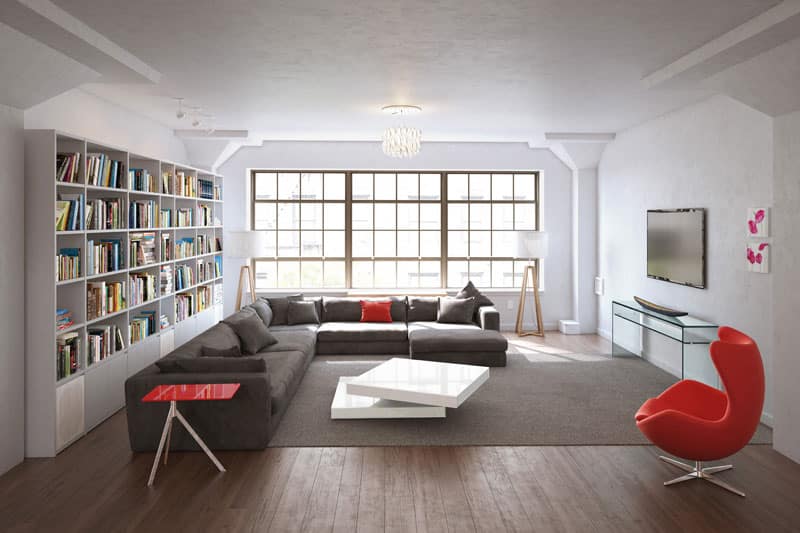 Gemütlichkeit erzeugen: durch Farbharmonie in der Wohnung
Bild zeigt Raum der mit braunem Sofa, rotem Sessel und viel weißen Wänden harmonisch wirkt