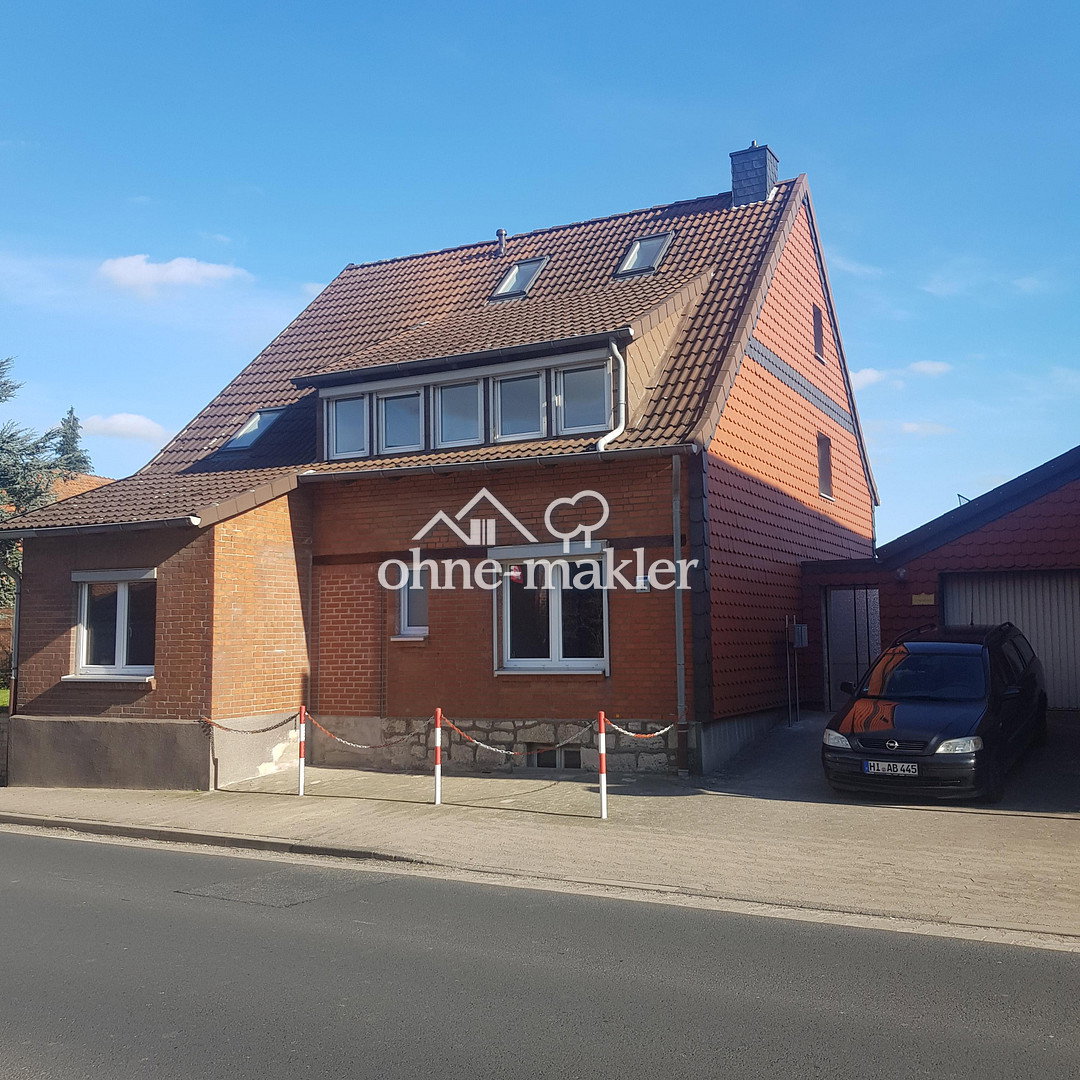 Charmantes Zweifamilienhaus in Giesen – zentral, 31180 Giesen
