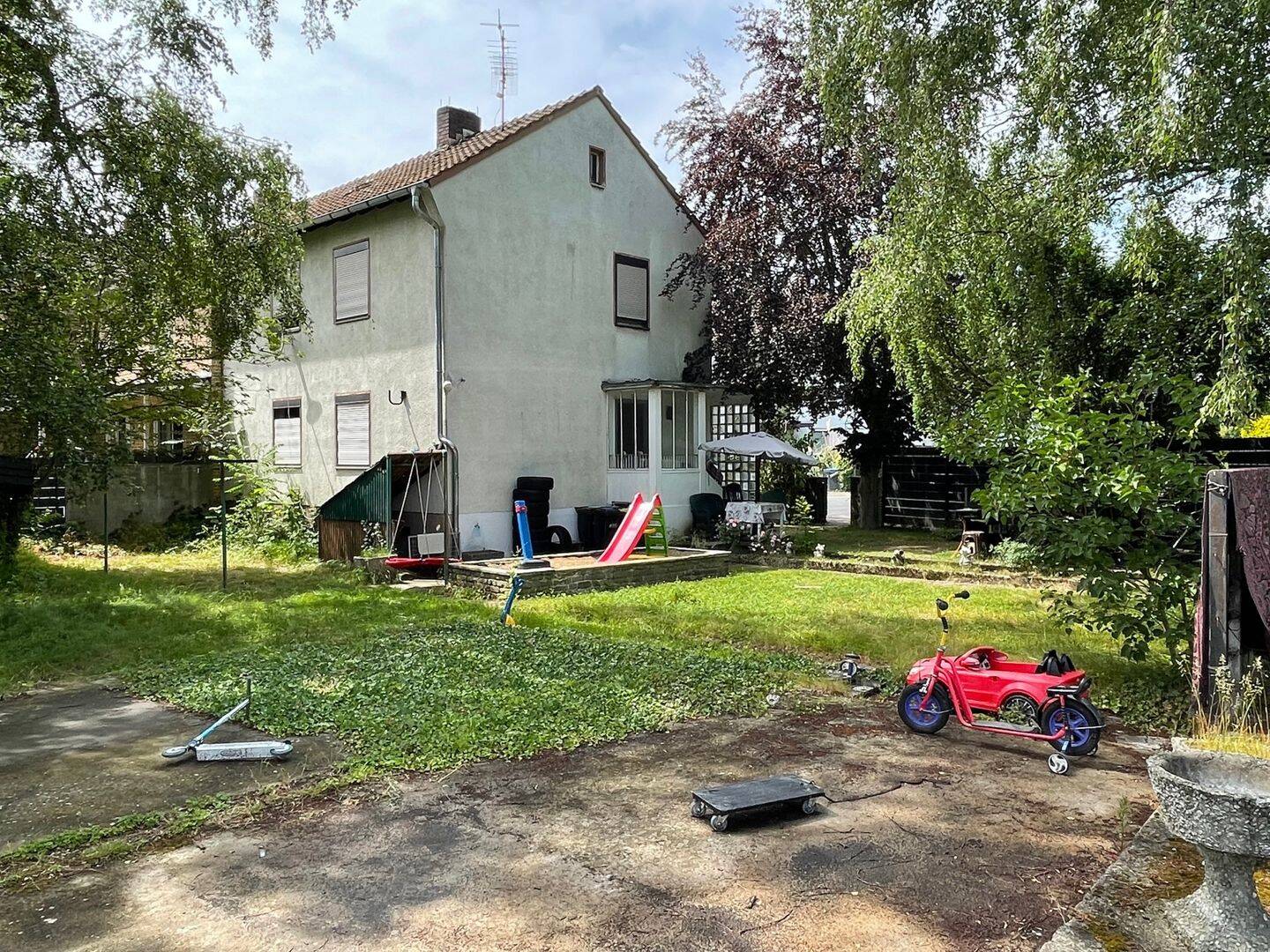 Attraktives Baugrundstück mit genehmigter Planung für ein 4-Familienhaus, 51069 Köln (Mülheim Dellbrück Dünnwald Höhenhaus)