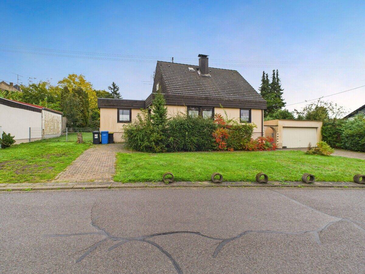 Familienfreundliches Einfamilienhaus mit großzügigem Grundstück, 66798 Wallerfangen