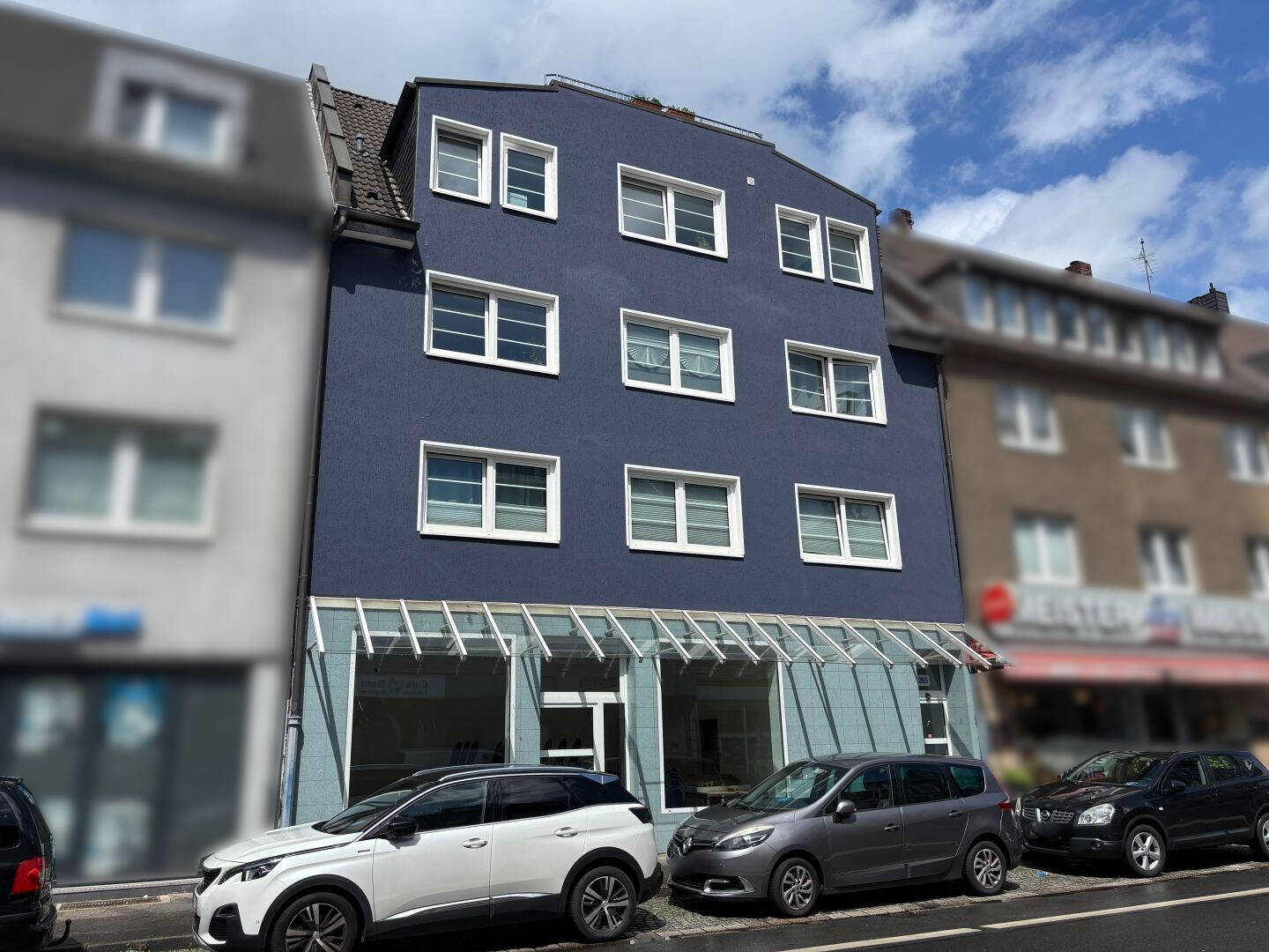 Vielseitiges Immobilien-Ensemble in Reisholz: bereits geteiltes MFH, Gewerbe und Garagenhof, 40599 Düsseldorf (Benrath Hassels Holthausen Reisholz)