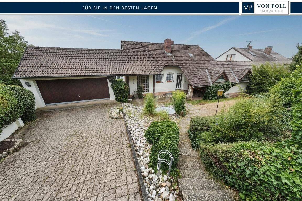 Aussichtsreiches Raumwunder: Einfamilienhaus mit Einliegerwohnung und Traumblick in Neustadt, 91413 Neustadt a.d. Aisch