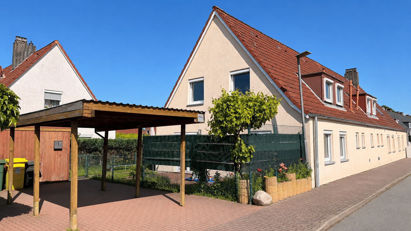 Ruhig wohnen, zentral leben – gepflegtes Reihenendhaus mit Carport, großem Garten und Terrasse, 25836 Garding