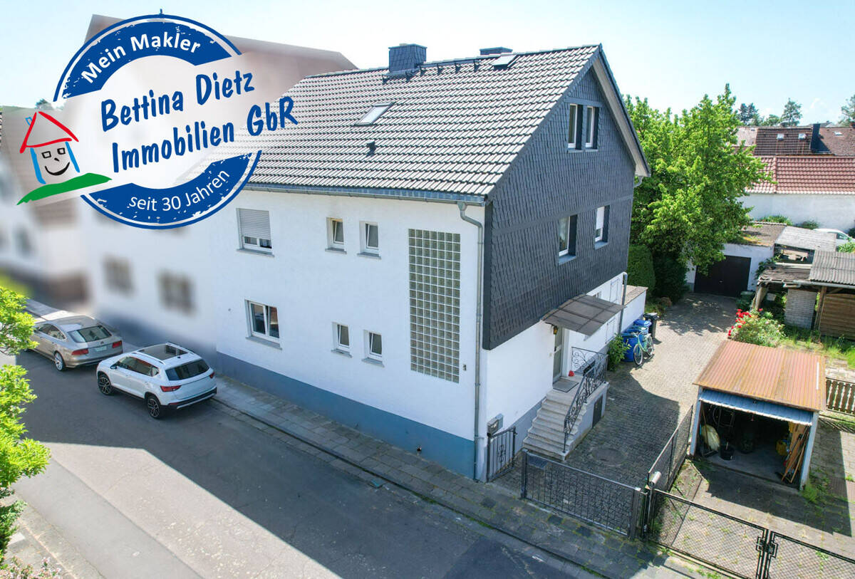 DIETZ: Gut geschnittenes 2-Familienhaus mit Garten, Garage und Nebengebäude in Babenhausen Langstadt, 64832 Babenhausen