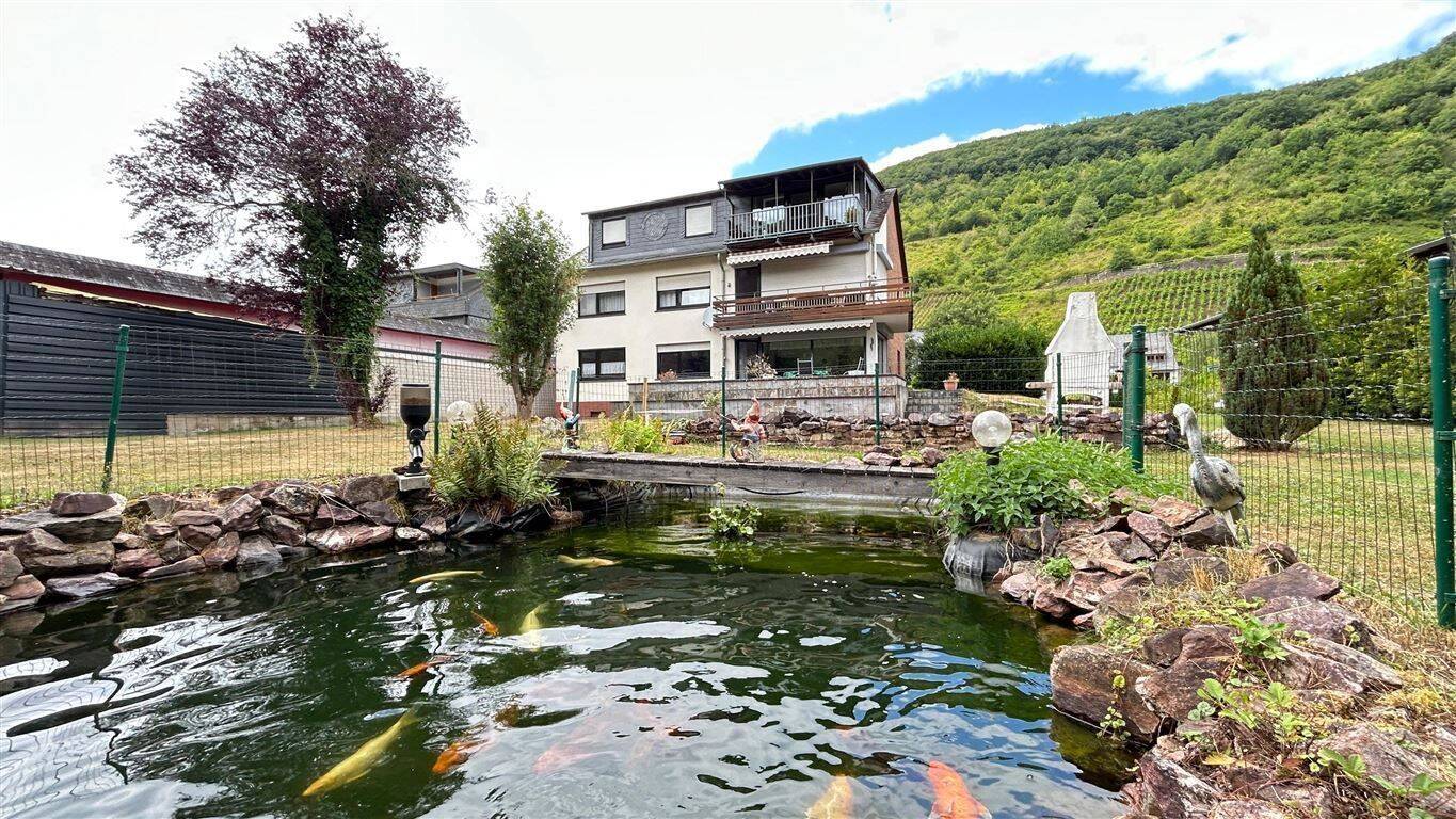 Wohnen wie im eigenen Haus – Gartenparadies, Sonnenterrasse & Doppelgarage in Alf, 56859 Alf