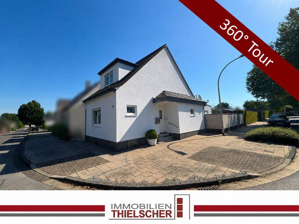 Gepflegtes Einfamilienhaus auf attraktivem Zweifrontengrundstück mit Garten und Garage, 52531 Übach-Palenberg