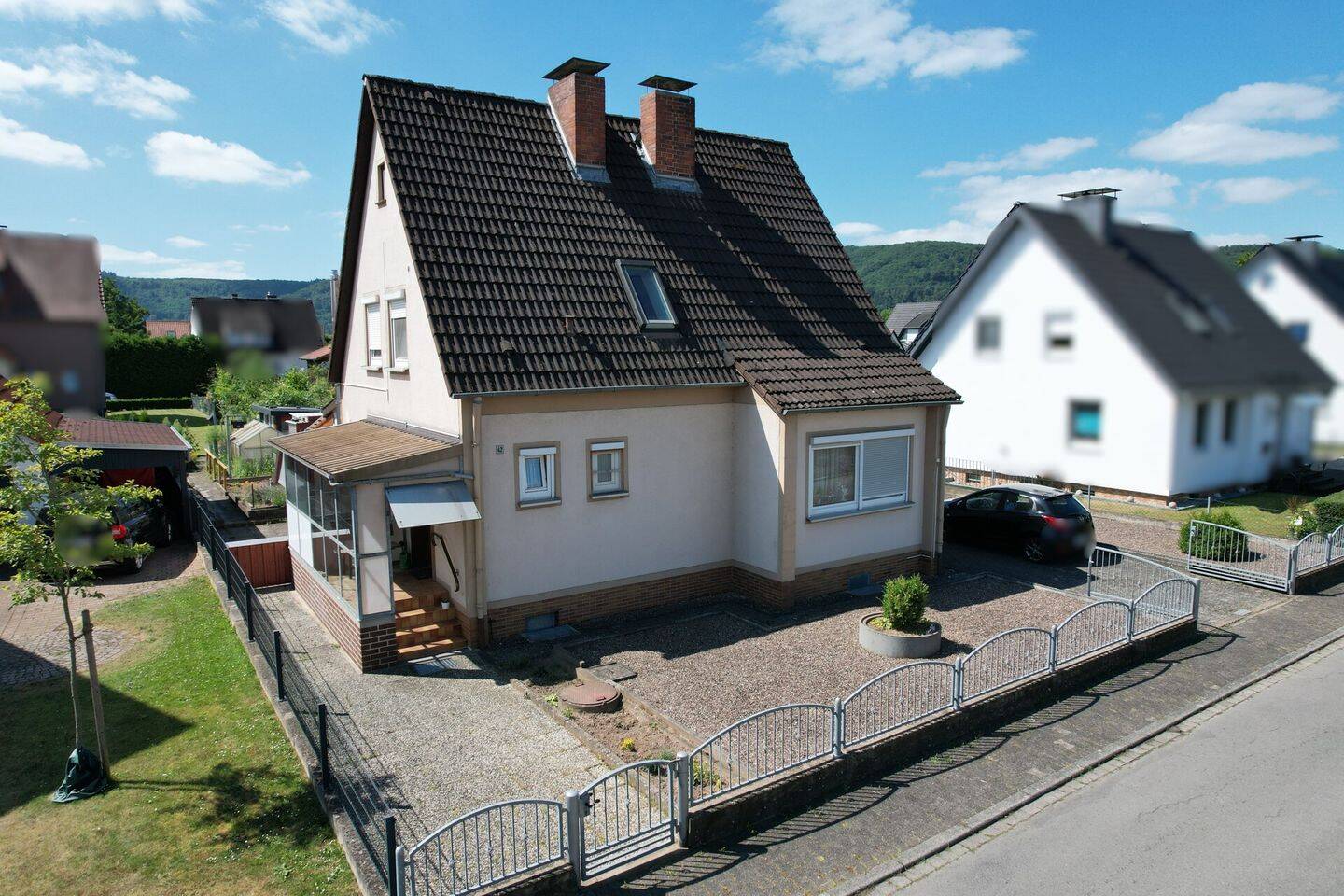 Gepflegtes Einfamilienhaus mit Garage und Anbau in Lauenförde, 37697 Lauenförde