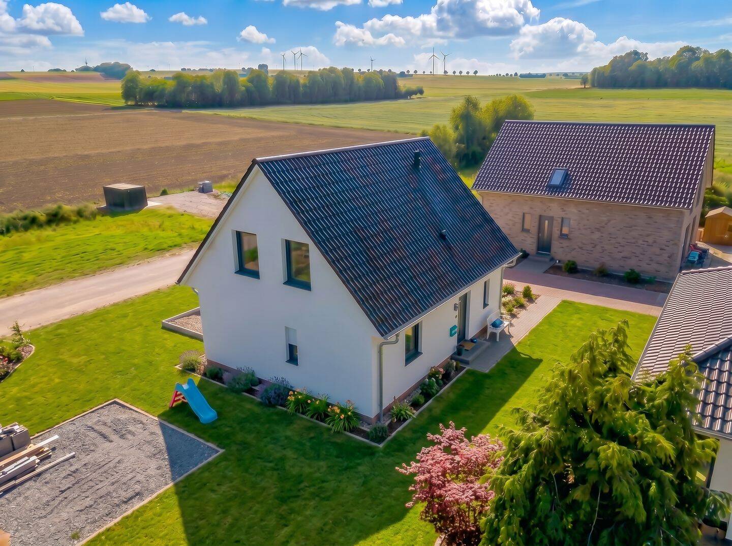 KfW-40-QNG-Einfamilienhaus auf großem Eckgrundstück in ruhiger Feldrandlage von Uelversheim, 55278 Uelversheim