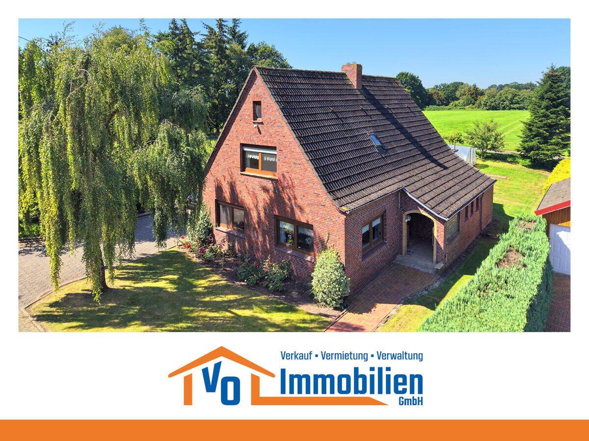 Idyllisch wohnen in Wiesmoor-Marcardsmoor: Einfamilienhaus in zweiter Reihe mit Kanalnähe, 26639 Wiesmoor