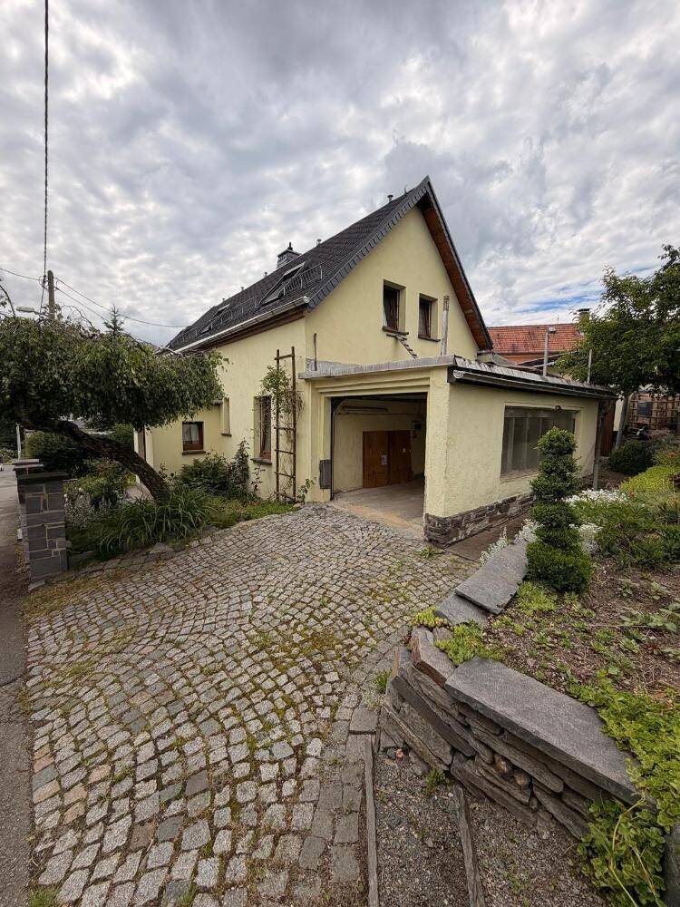 Objekt-Nr.: 5526 – Gemütliches freistehendes Einfamilienhaus mit Garage und Werkstatt in Plauen (Großfriesen), 8541 Plauen