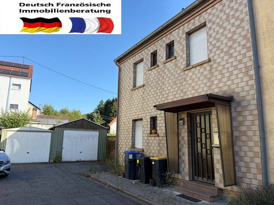 Einfamilienhaus in Dudweiler mit Garten und zwei Garagen, 66125 Saarbrücken