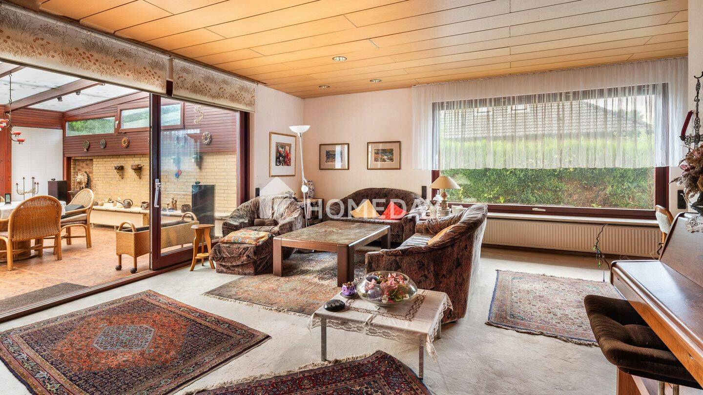 Viel Grundstück mit viel Potenzial: Einfamilienhaus mit Garten und Garage, 25469 Halstenbek