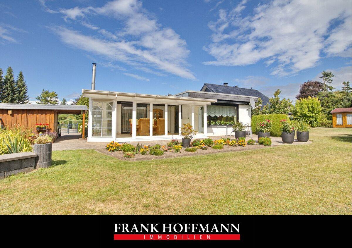 Gut geschnittener Bungalow mit Wintergarten und Carport auf schönem Grundstück in Kisdorf, 24629 Kisdorf