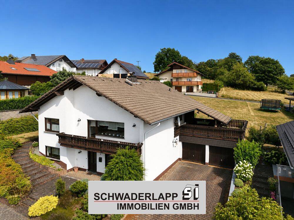Viel Raum für Ihre Wohnideen – Einfamilienhaus mit Einliegerwohnung in schöner Ortsrandlage mit Fernblick, 56244 Hartenfels