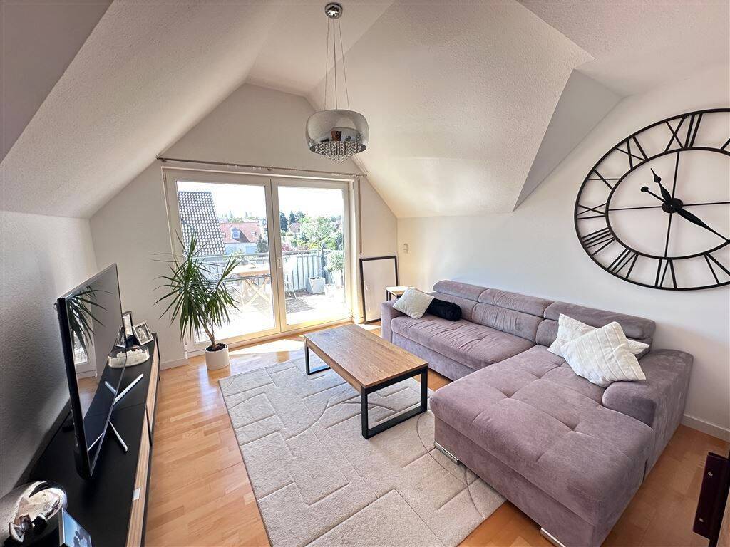 Helle und offen gestaltete Dachgeschosswohnung mit zwei Balkonen