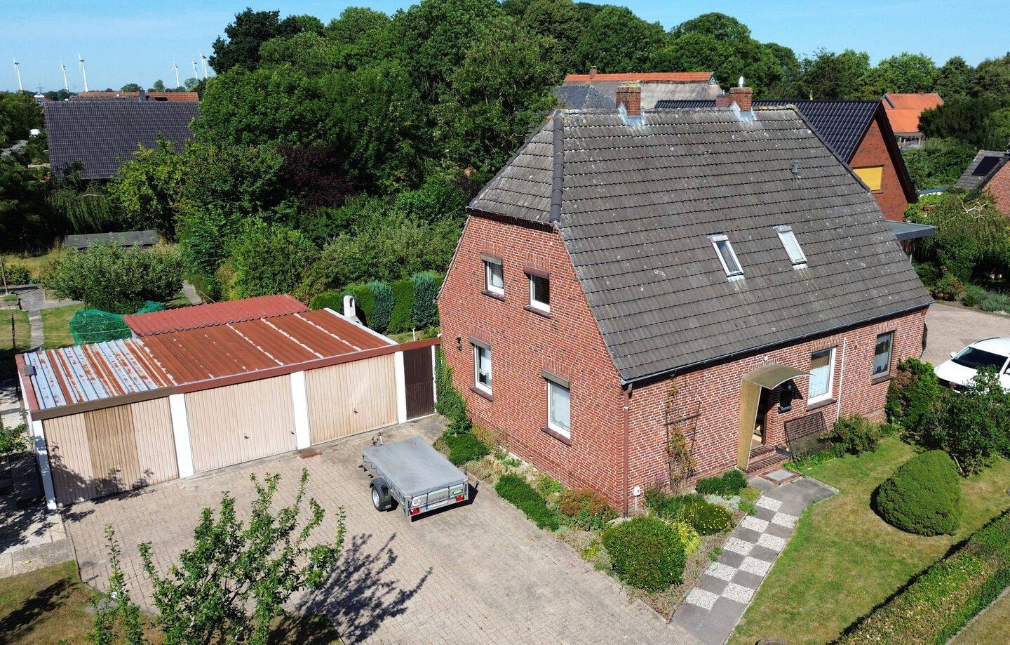 Viel Potential zum fairen Preis! Einfamilienhaus mit 5 Zimmern, großem Garten und drei Garagen, 26919 Brake (Unterweser)