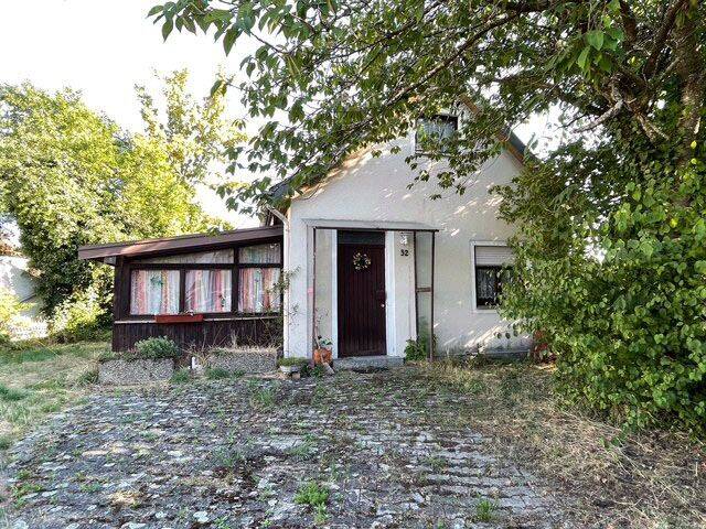 Bungalow mit großem Garten und vier Garagen, 78647 Trossingen