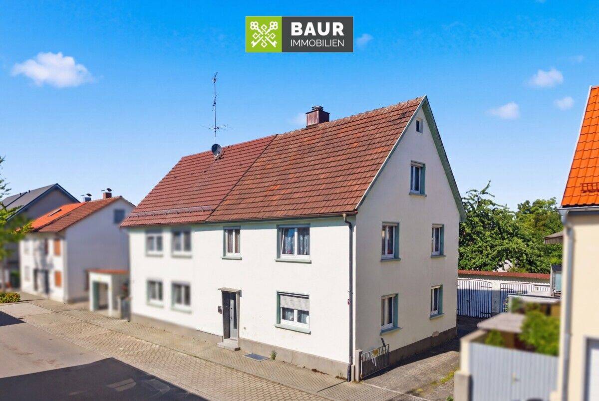 Vermietete Doppelhaushälfte mit Potenzial in stadtnaher Lage von Bad Saulgau, 88348 Bad Saulgau