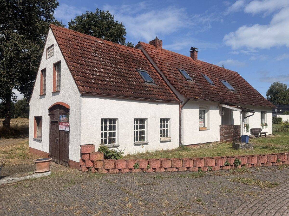 Großefehn-Bagband, Einfamilienhaus mit Einliegerwohnung, Werkstatt und Gartenland, 26629 Großefehn