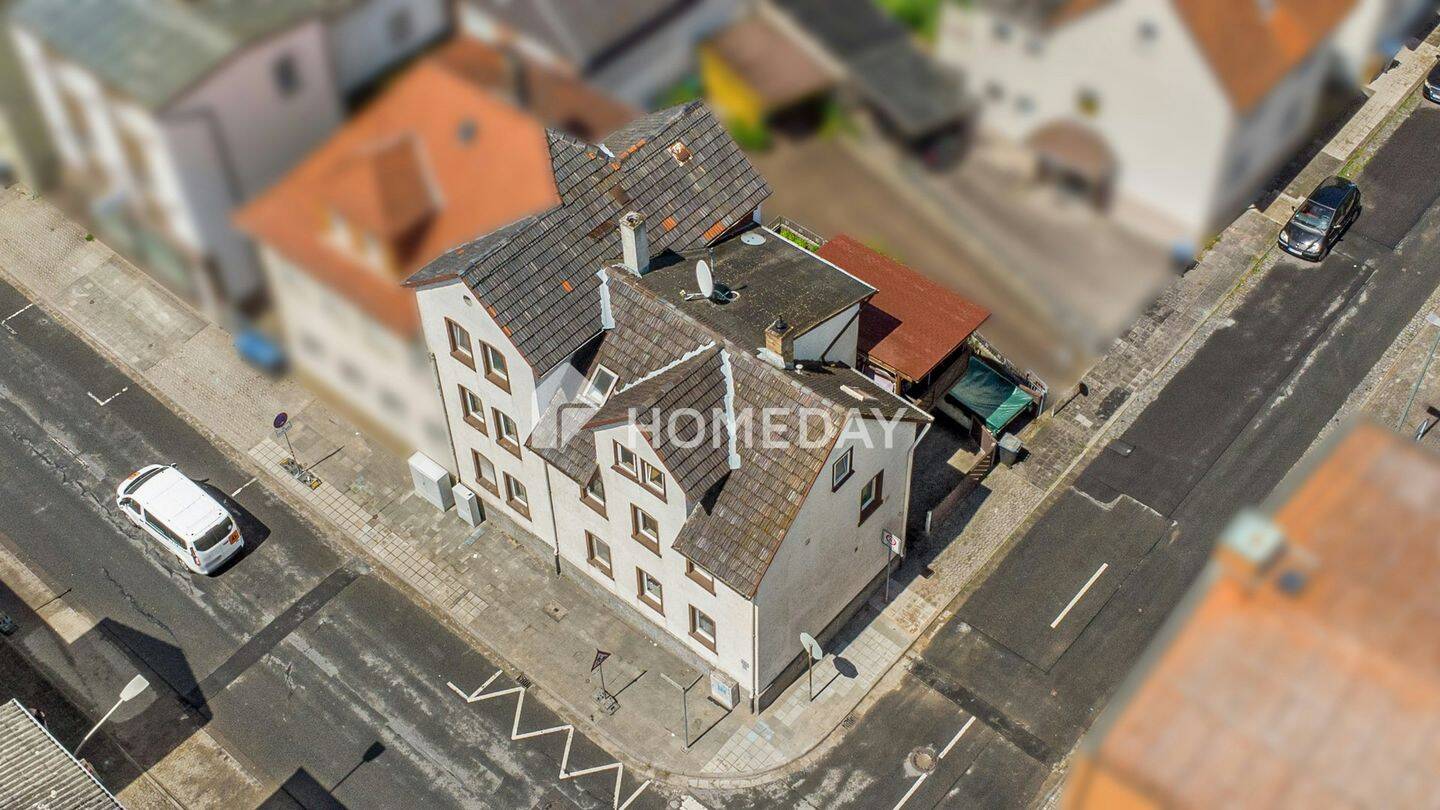 Vielseitiges Raumwunder in Ecklage: Großzügiges Haus mit Potenzial für bis zu drei Wohneinheiten, 35396 Gießen