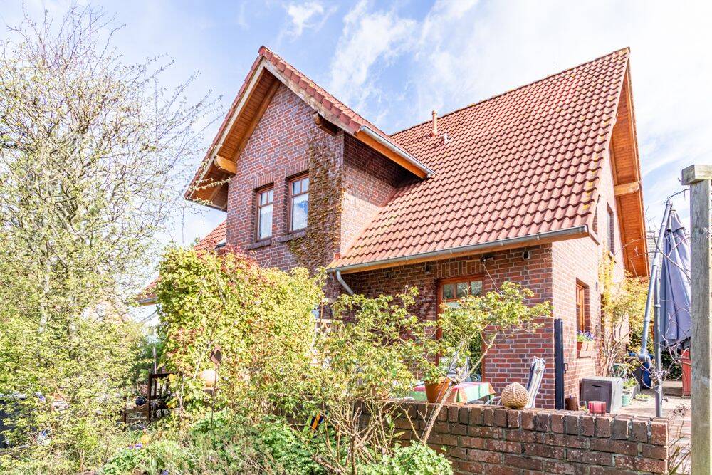 Solides Einfamilienhaus mit sonnigem Garten in familienfreundlicher Lage, 26723 Emden