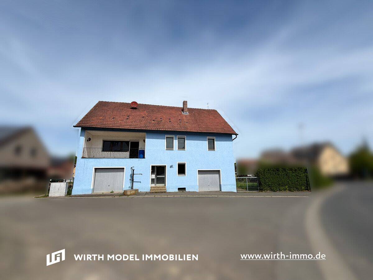 Immobilie mit zwei Garagen auf großem Grundstück | Reichmannshausen, 97453 Schonungen