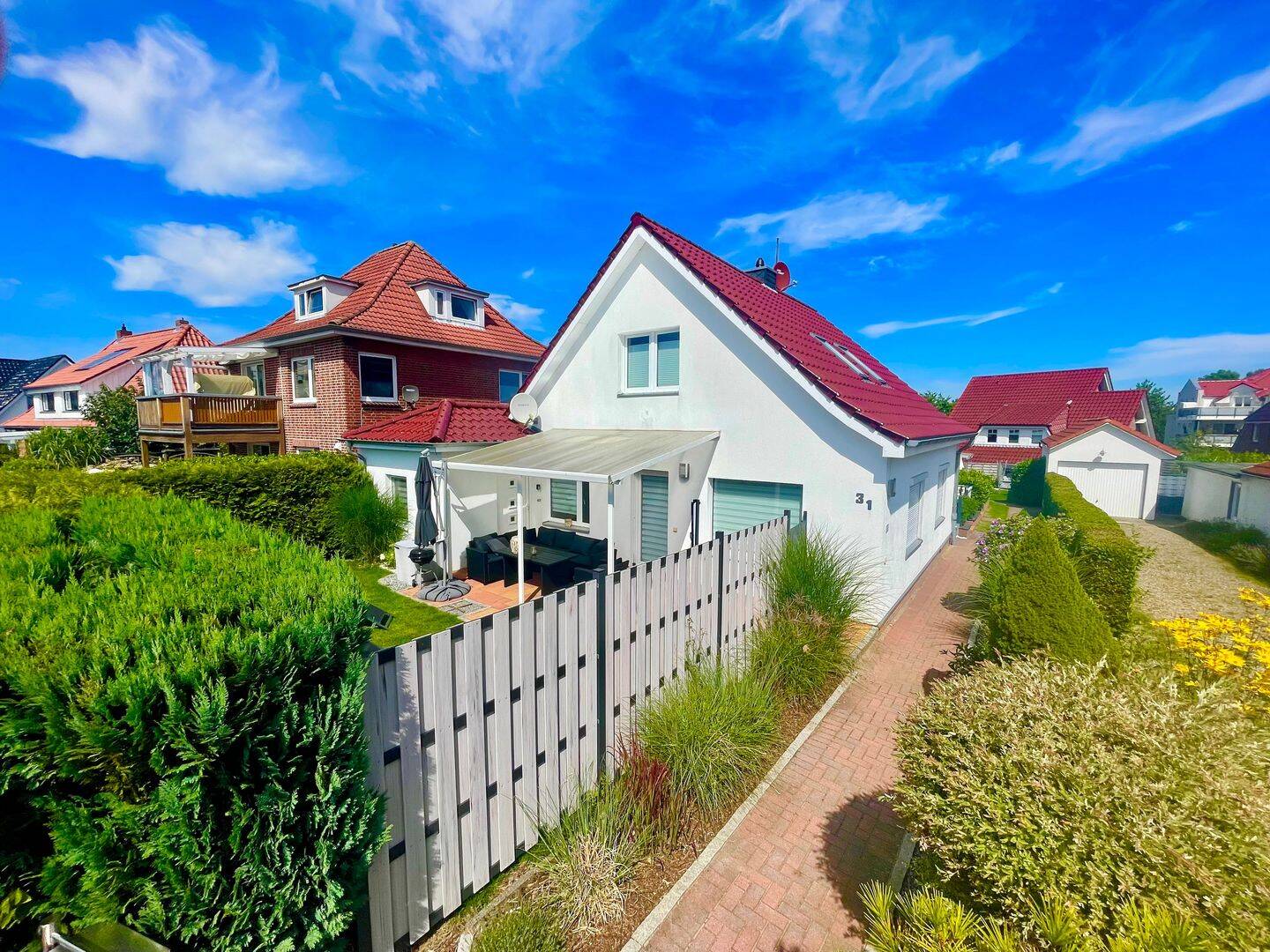 Strandnahe Erdgeschosswohnung mit privatem Garten, Südwest-Terrasse und eigenem Stellplatz, 23683 Scharbeutz