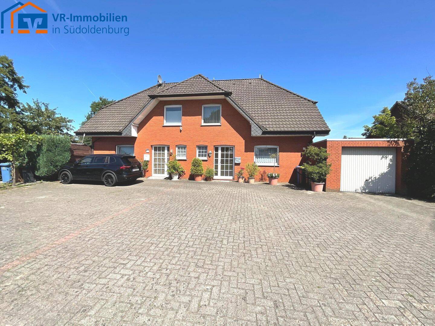 Zentrumsnah in Garrel: Gepflegtes Doppelhaus mit Garage und PKW-Stellplätzen!, 49681 Garrel
