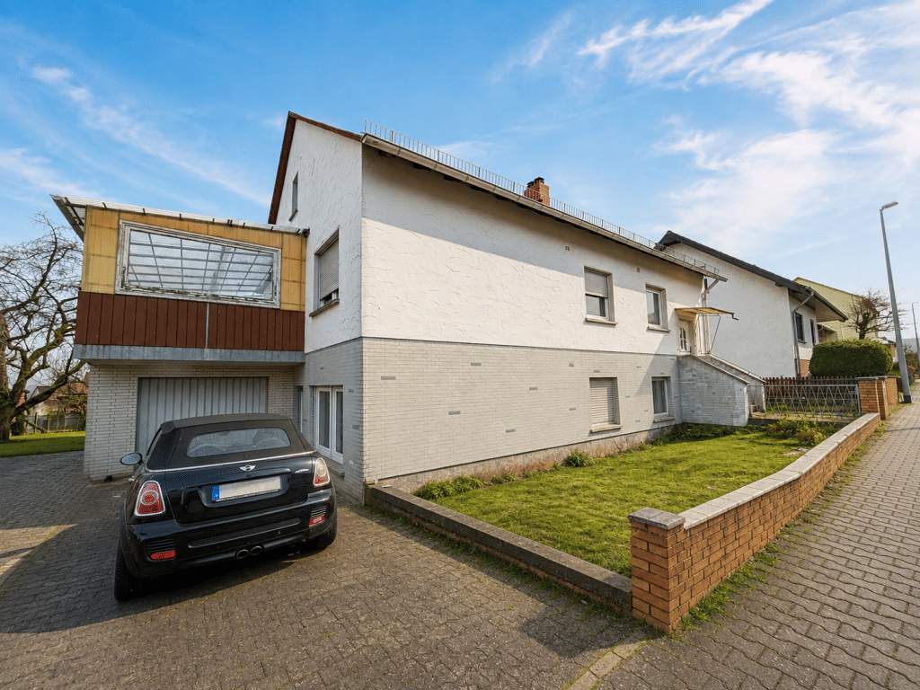 Freistehendes Einfamilienhaus mit Garage, Garten und Ausbaupotenzial in Hünfelden-Mensfelden Großzügiges Wohnhaus…, 65597 Hünfelden