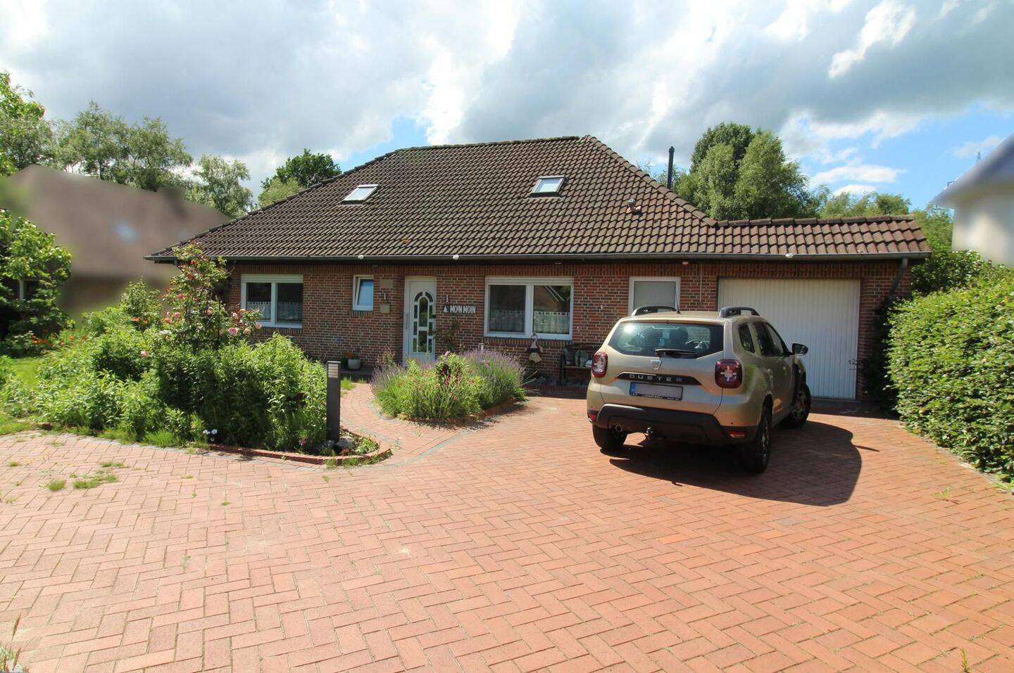 Großzügiger Bungalow mit lichtdurchflutetem Anbau, gemütlichem Sommergarten und Heizungsanlage aus 2023!, 26810 Westoverledingen