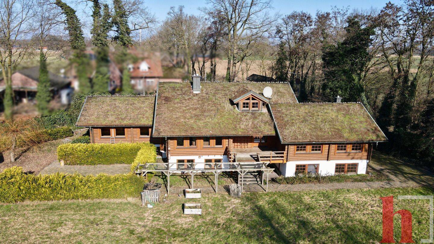 Besonderes Holzhaus mit Wohnung und großzügigem Nebengebäude in idyllischer Lage, 49439 Steinfeld (Oldenburg)