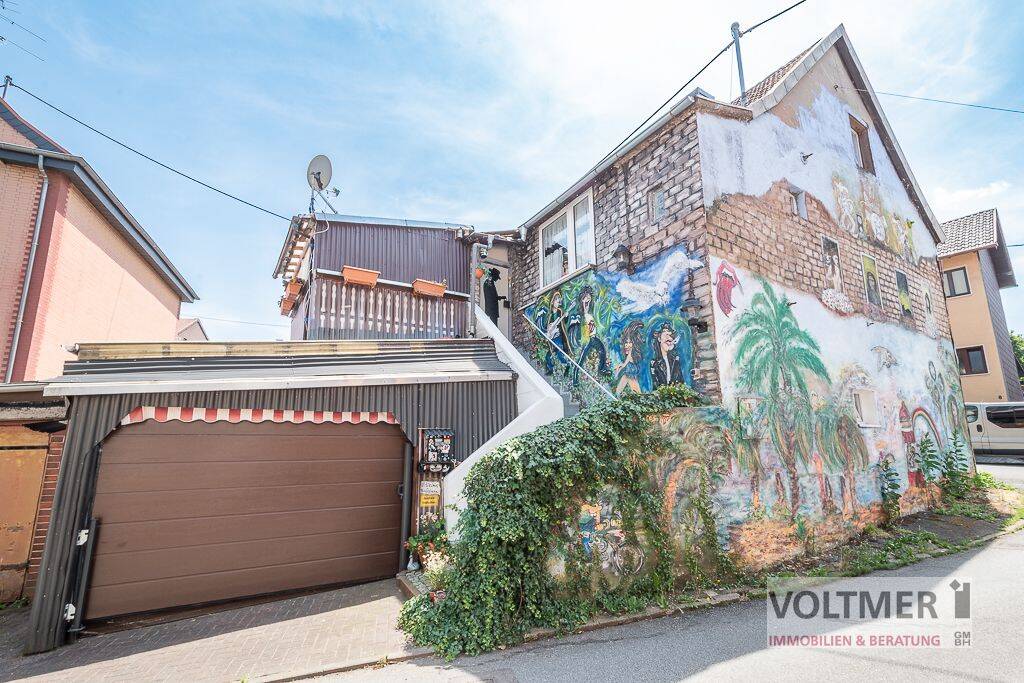 AUFFÄLLIG – Einfamilienhaus mit Garage und Einliegerwohnung in ruhiger Lage von Wiebelskirchen!, 66540 Neunkirchen