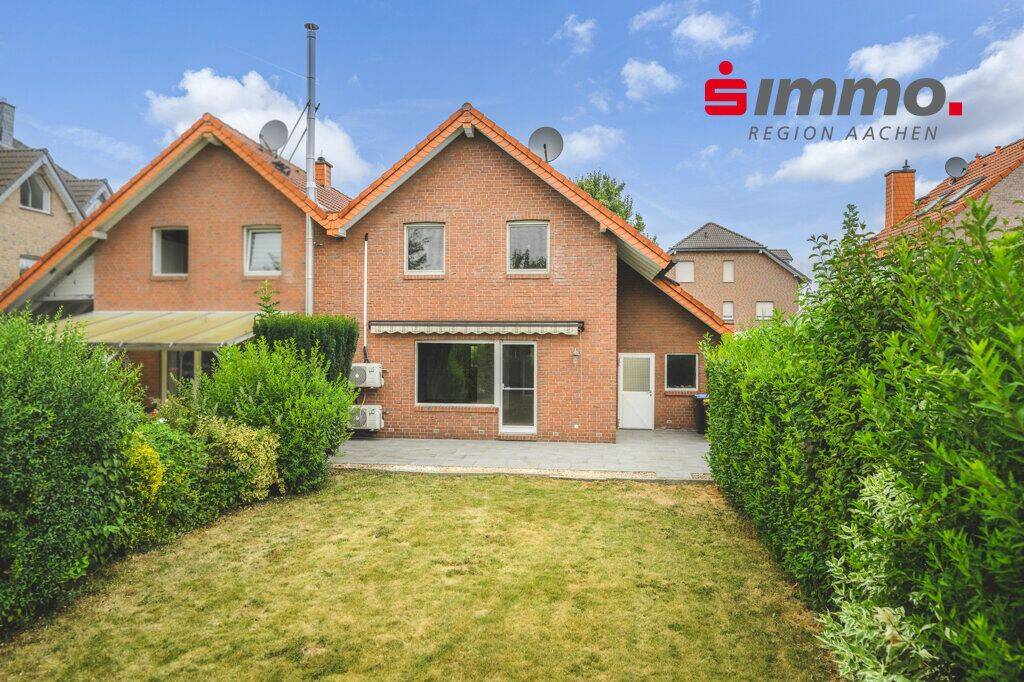 Geilenkirchen-Bauchem, Doppelhaushälfte mit großer Garage und schönem Garten in beliebter Wohnlage, 52511 Geilenkirchen