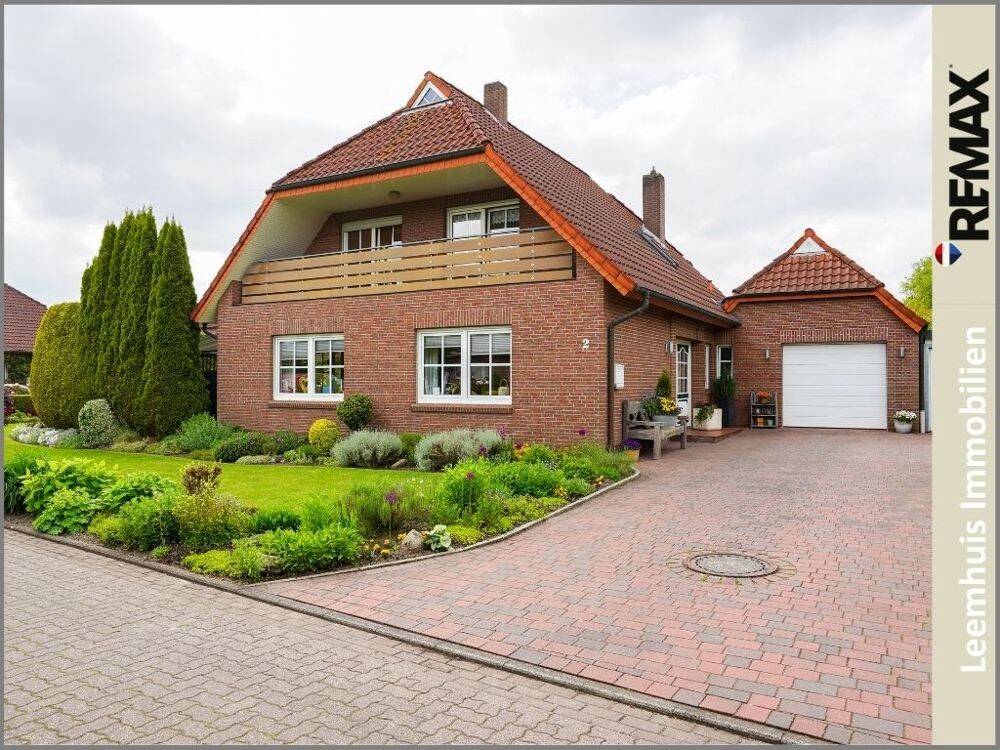 Gepflegtes Einfamilienhaus mit parkähnlichem Garten in bester Lage von Bunde!, 26831 Bunde
