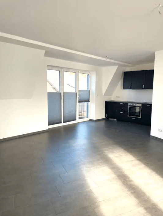 Moderne Dachgeschosswohnung in zentraler Lage mit Balkon und Einbauküche, 49757 Werlte