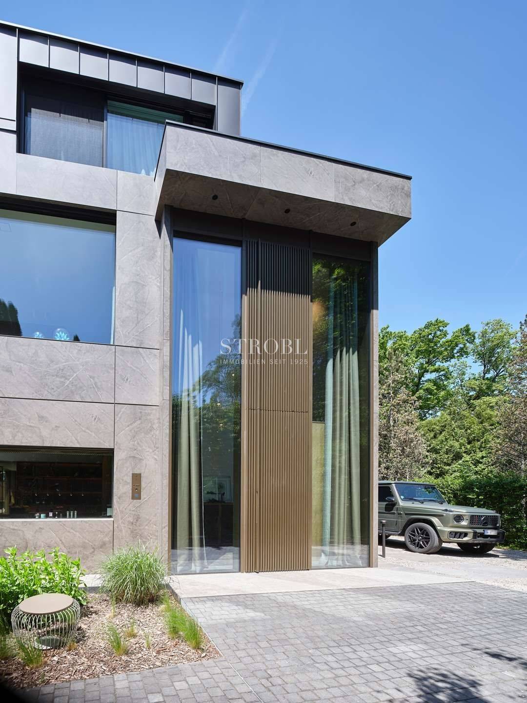 UNIQUE I Monolithische Villa mit Tiefgarage und Einliegerwohnung, 82031 Grünwald