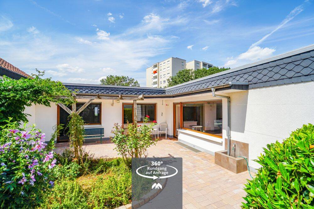 Wohnen auf einer Ebene: Top gepflegter Winkelbungalow mit Garage in der Weinheimer Weststadt!, 69469 Weinheim