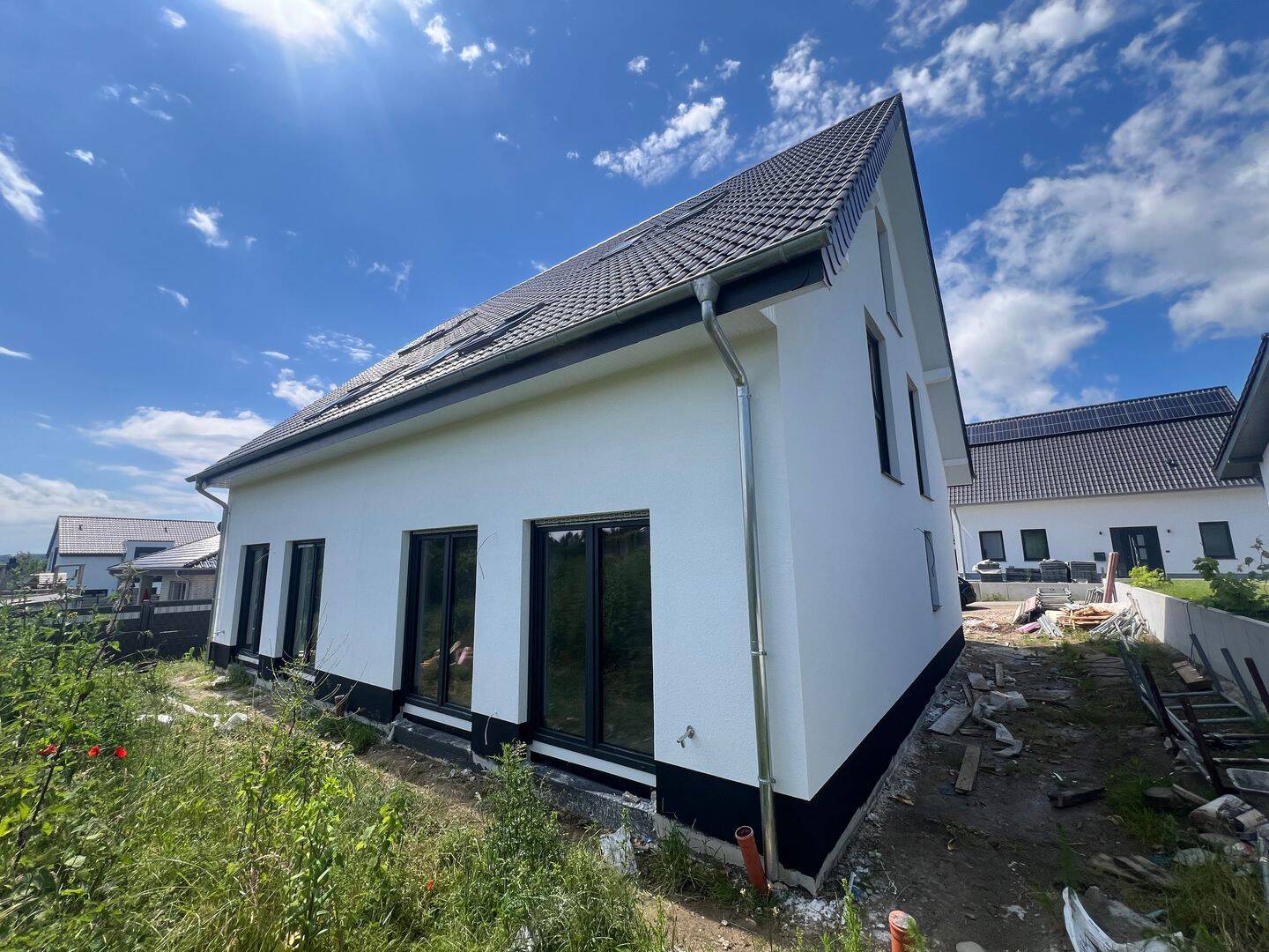 Moderne Neubau-Doppelhaushälfte mit Terrasse – energieeffizient im KfW-55-Standard, 32278 Kirchlengern
