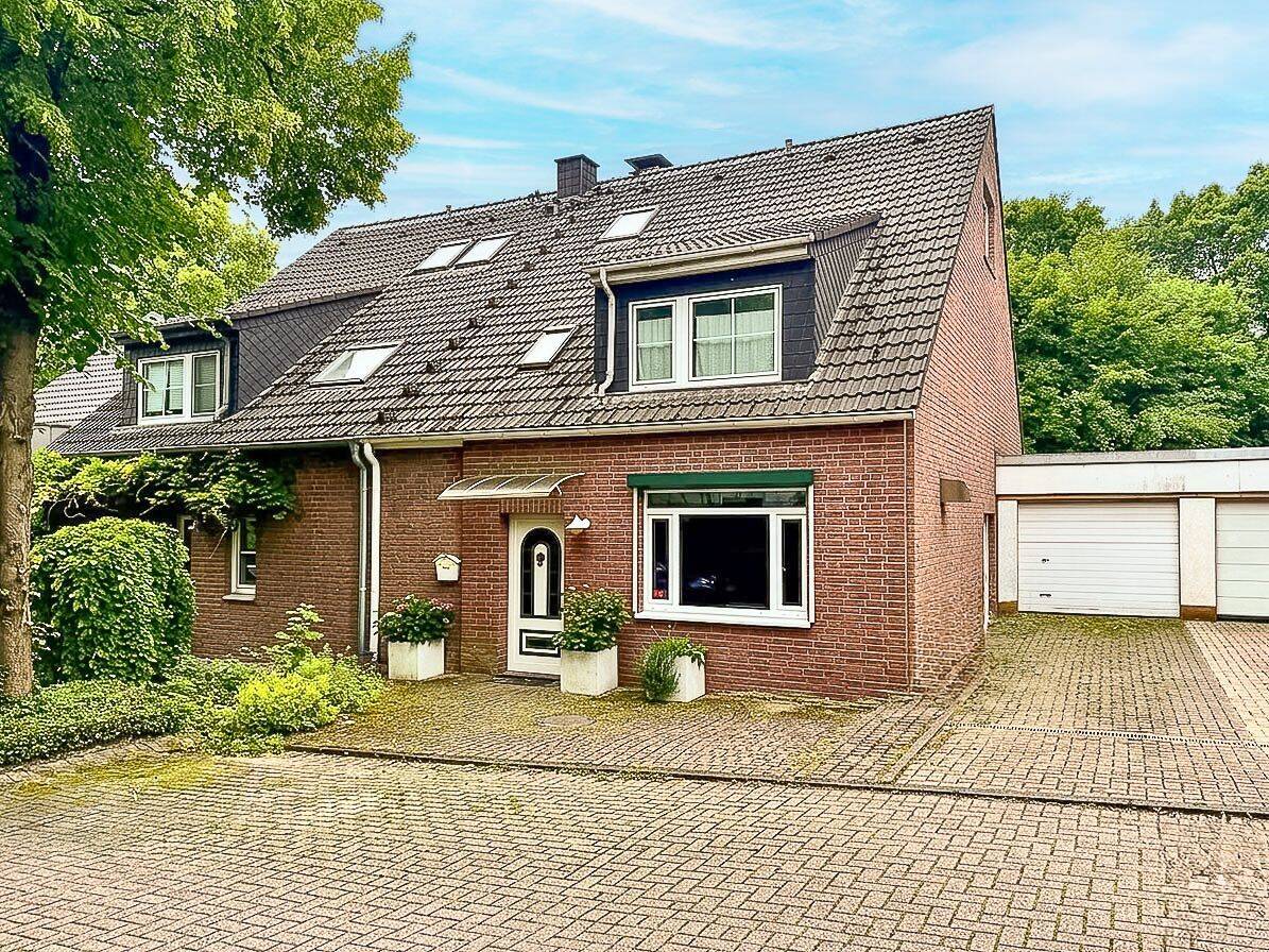 Energieklasse A: Doppelhaushälfte mit Einliegerwohnung und top Südwestlage in Erkrath-Hochdahl, 40699 Erkrath