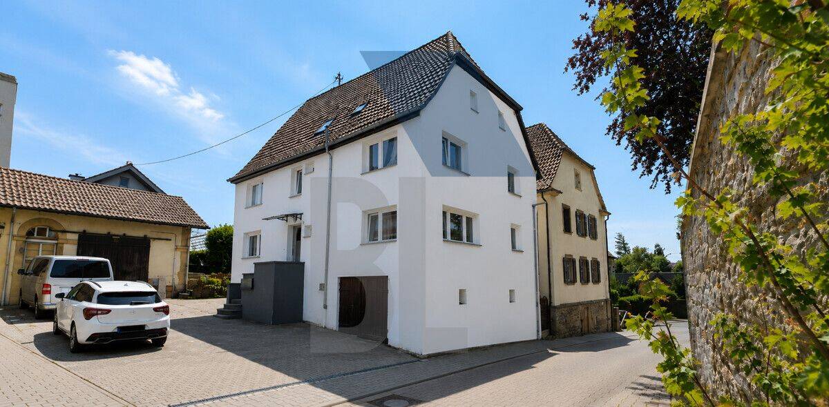 „Vielseitiges Mehrfamilienhaus mit drei Wohneinheiten und Scheune“, 74906 Bad Rappenau
