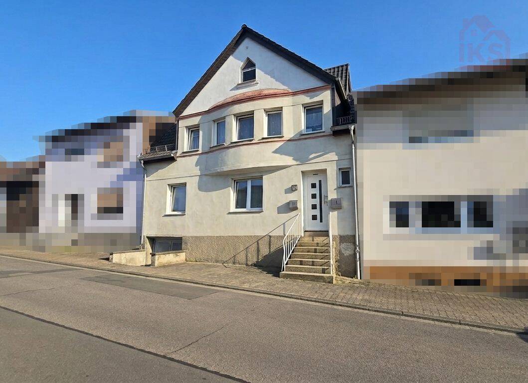 Modernisiertes Reihenmittelhaus mit zwei Wohneinheiten und Garten in Schiffweiler, 66578 Schiffweiler