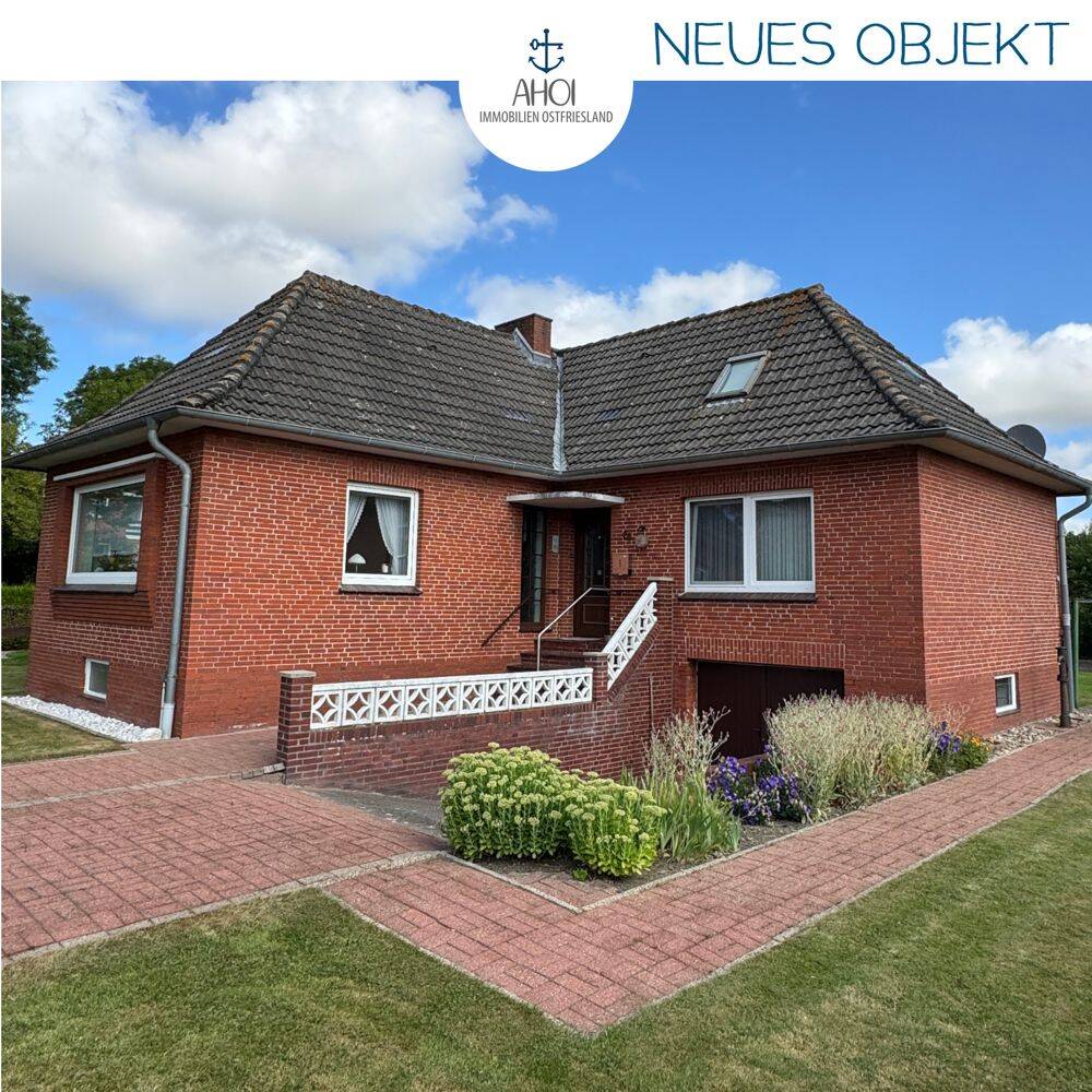 Leben auf einer Warft! Vollunterkellerter Winkelbungalow in schöner Lage!, 26736 Krummhörn
