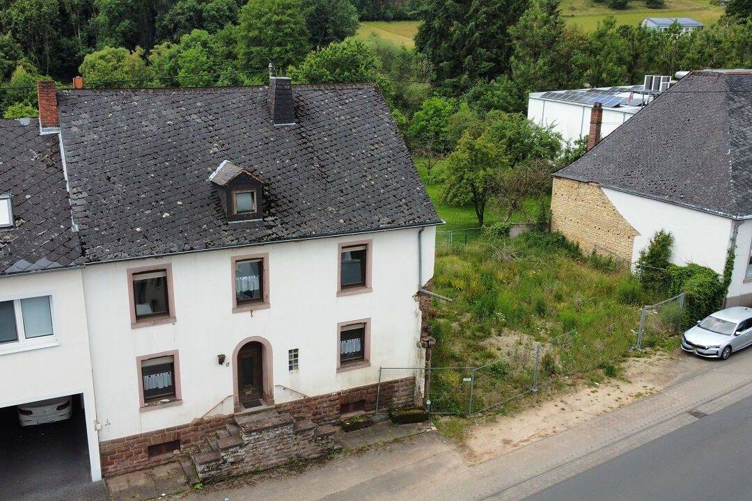 Einfamilienhaus mit zusätzlichem Bauland in Mettendorf, 54675 Mettendorf