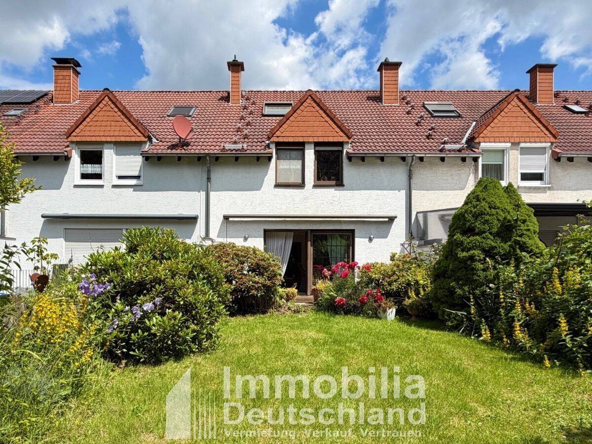 Familienglück in Schwerte-Wandhofen: Reihenmittelhaus mit Garten nahe der Ruhrauen, 58239 Schwerte