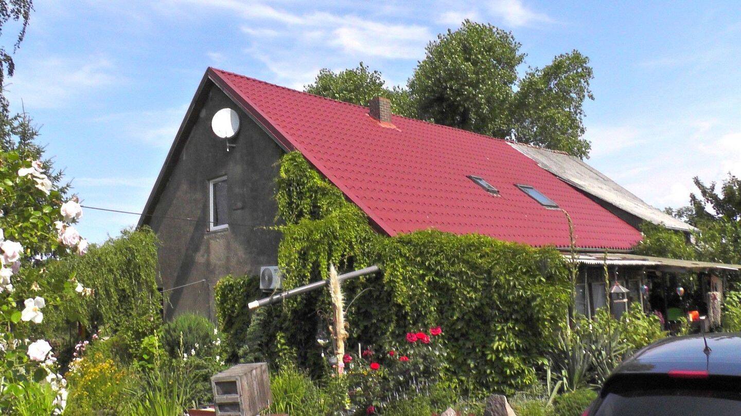Einfamilienhaus mit Scheunenanbau, 18233 Carinerland