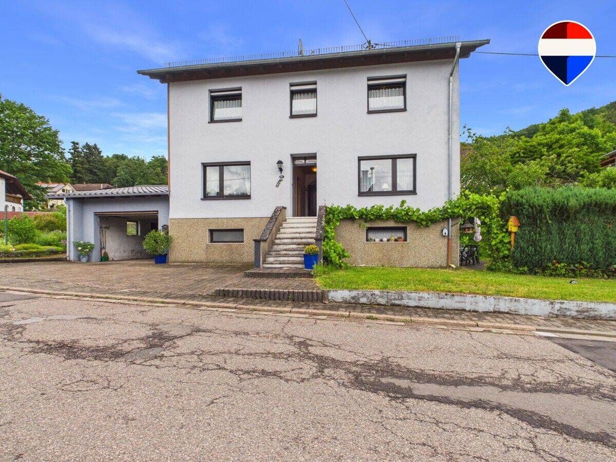 Familienhaus mit viel Platz, großer Garage und vielseitigen Nutzungsmöglichkeiten in Büschfeld, 66687 Wadern