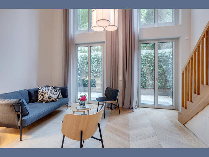 Möbliert: Herzogparksuiten | Junior-Suite mit Galerie und Garten