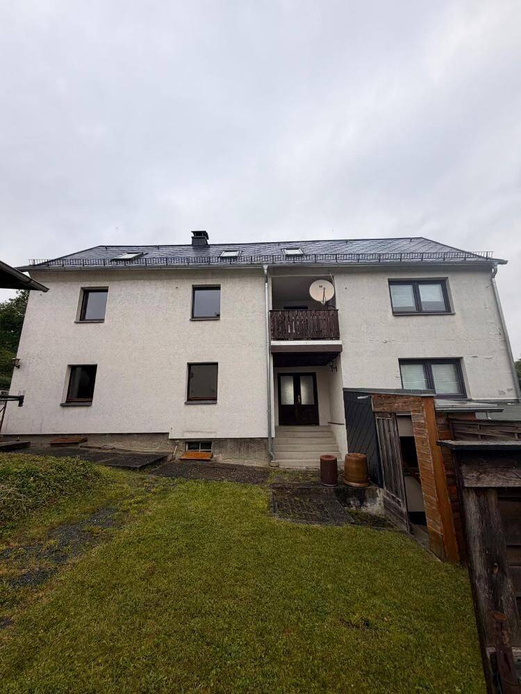 Objekt-Nr.: 57-1-26 – Paketangebot! Schönes Zwei- bis Dreifamilienhaus mit Garage und 3er-Garagenkomplex mit Gartenhaus in Plauen (Unterlosa), 8527 Plauen
