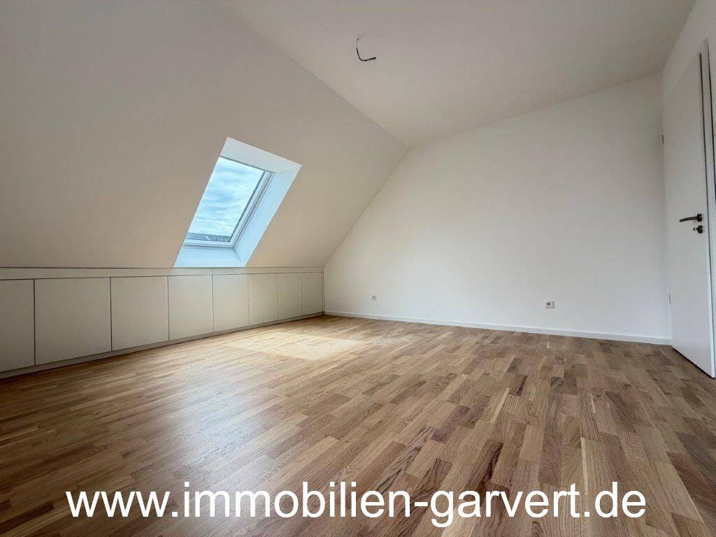 Neubau! Dachgeschoss-Wohnung mit Balkon, Tiefgarage und Aufzug in Rhade, 46286 Dorsten